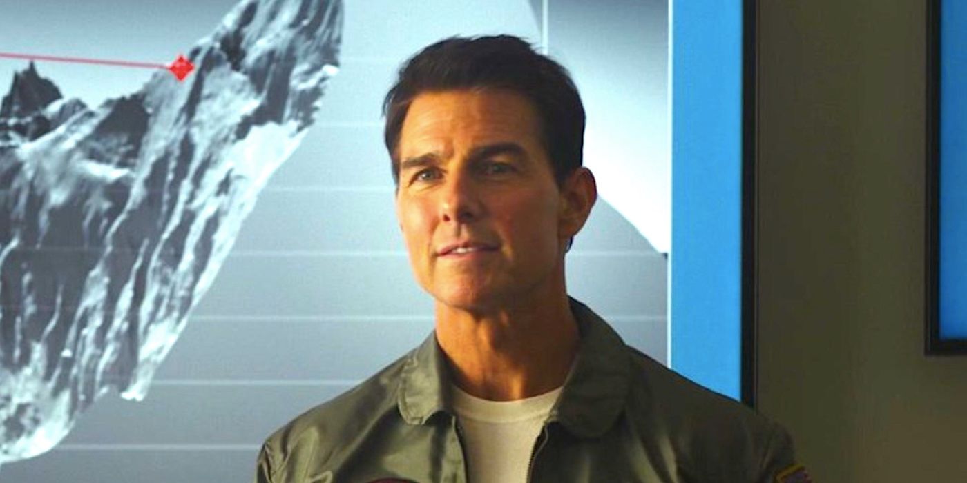 Tom Cruise's Maverick half smiles in front of a screen in Top Gun Maverick