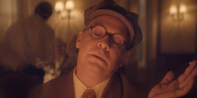 Tom Hollander As Truman Capote Smoking In Feud: Capote Vs. The Swans.jpg