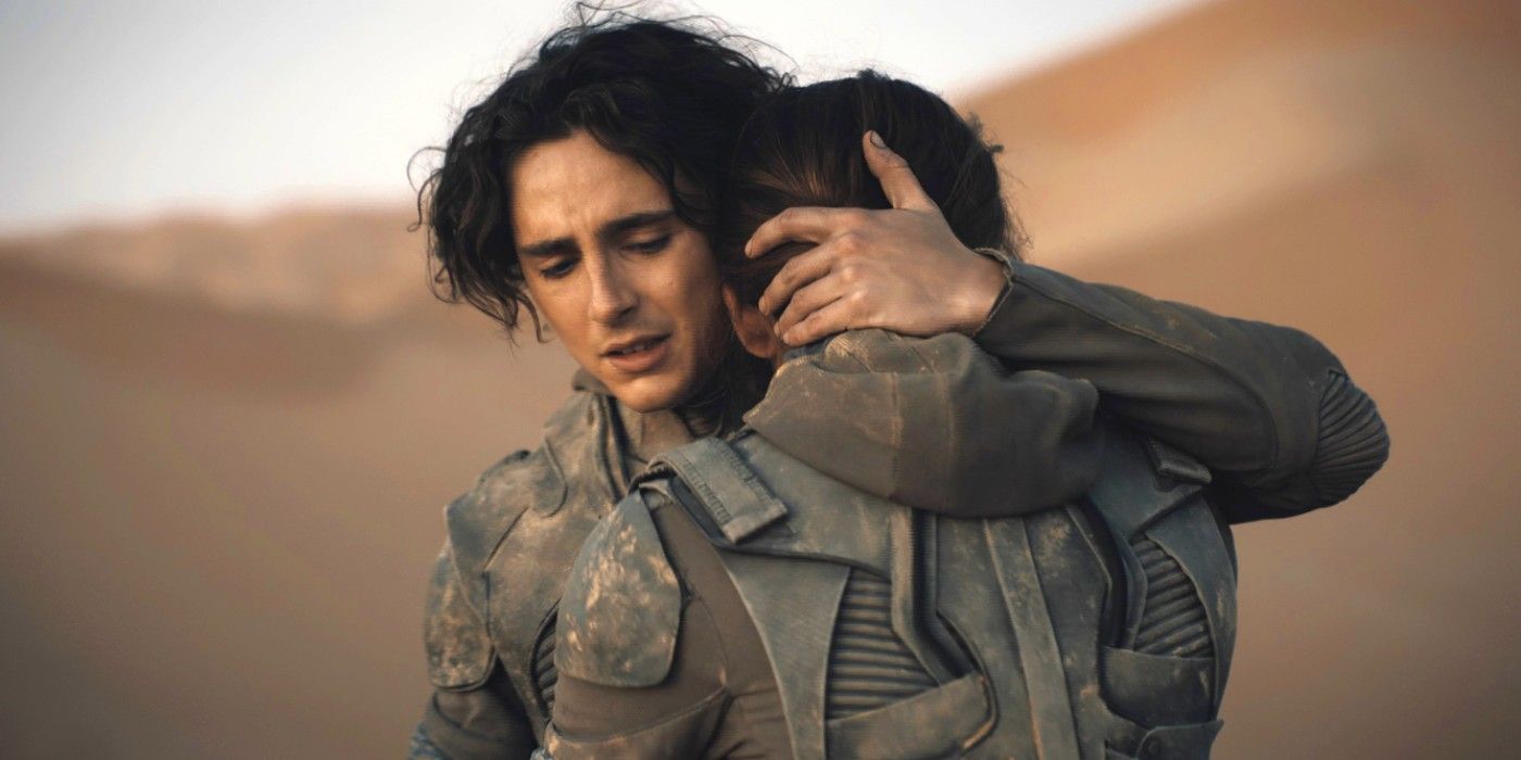 Paul, played by Timothée Chalamet, hugs Chani, played by Zendaya, in Dune: Part Two.