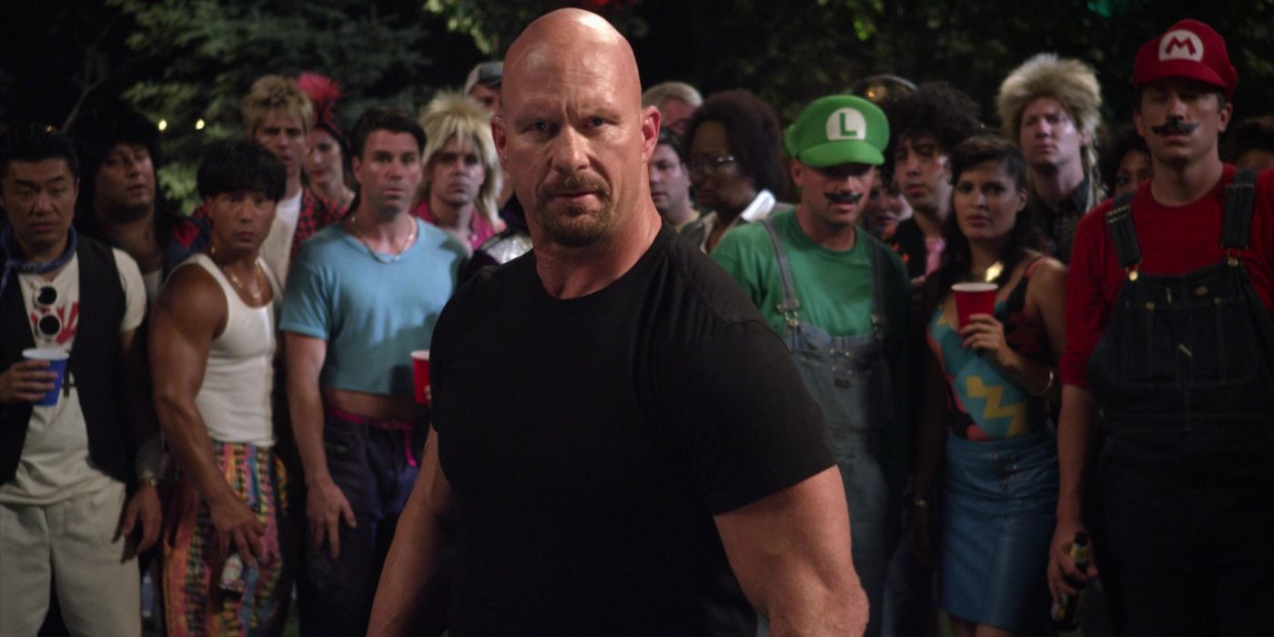 Stone Cold Steve Austin como Tommy, cercado por um grupo de foliões, em Grown Ups 2