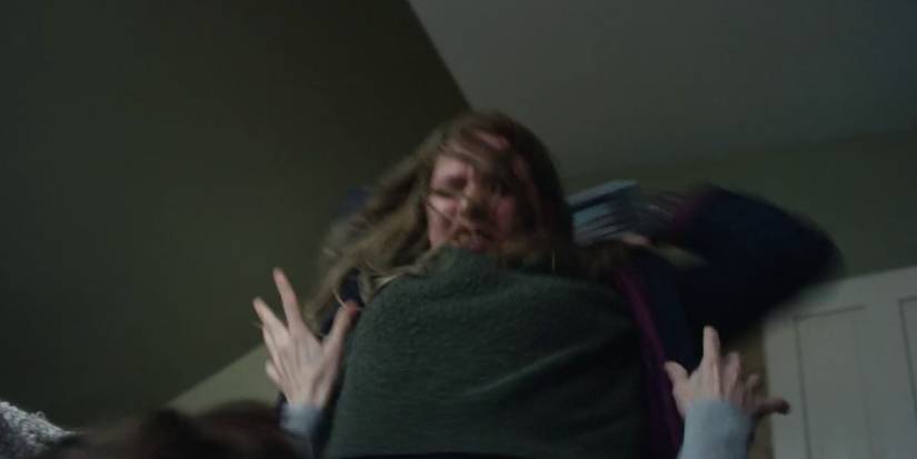 Sara attacking her mother, Marie, in the Black Mirror episode Arkangel