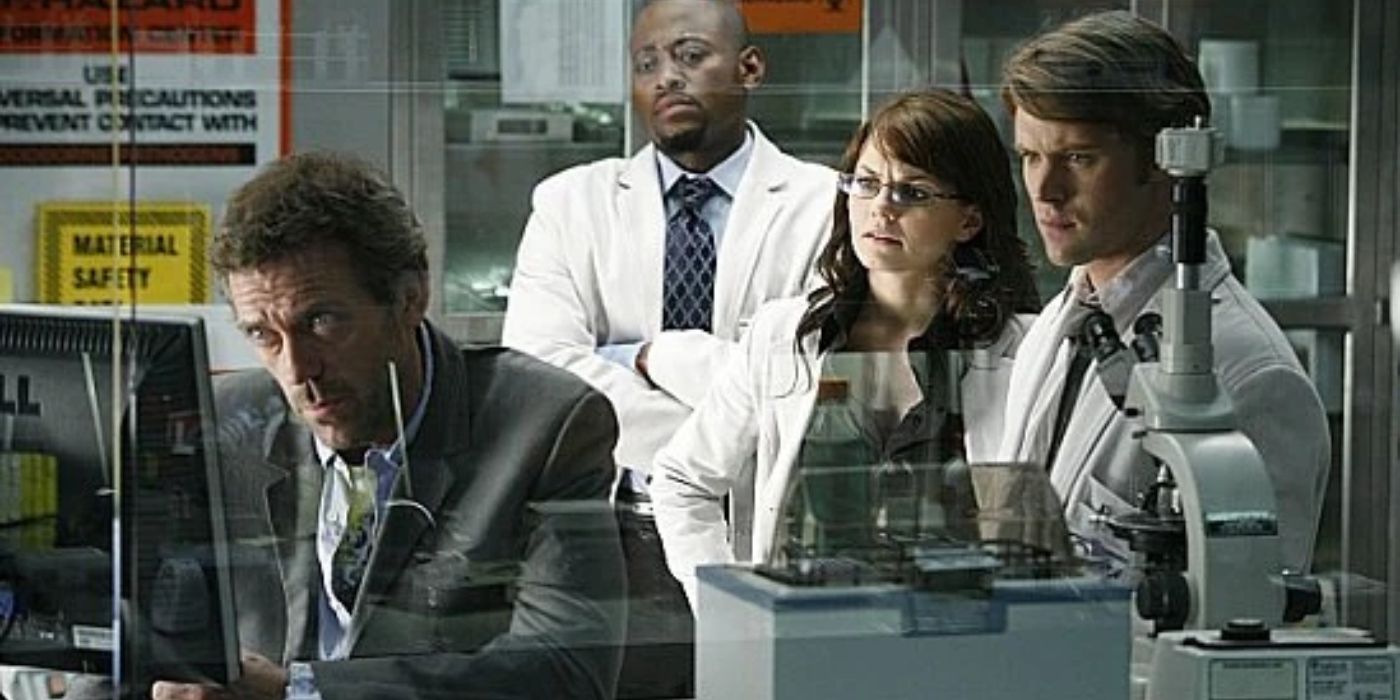 House, Foreman, Cameron, and Wilson gathered around a computer in a lab in House M.D.