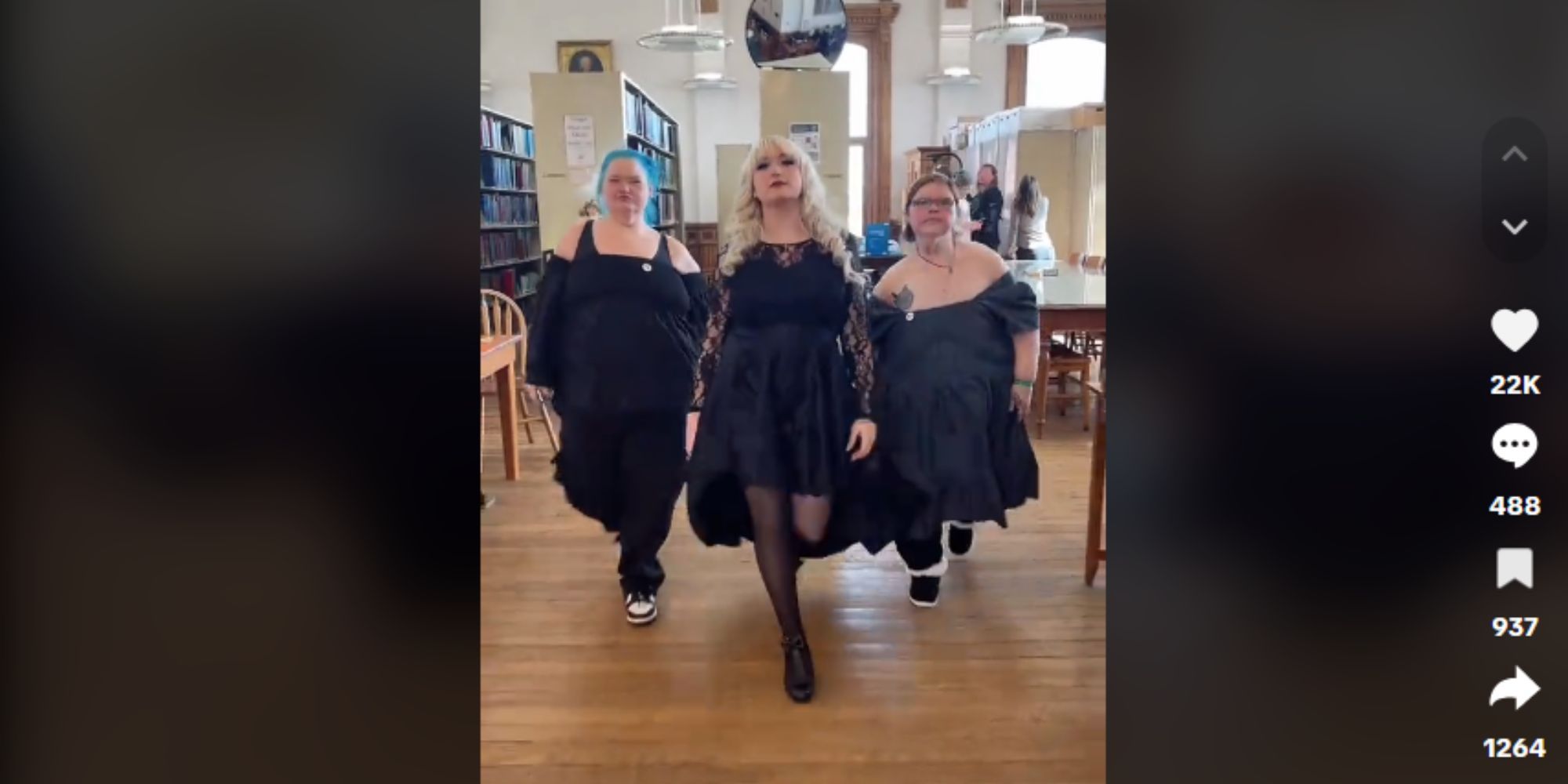 1000-lb Sisters' Amy Slaton and Tammy Slaton and friend in all black, catwalking at a library.