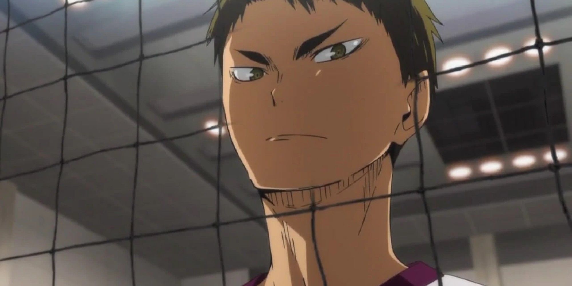 A younger Wakatoshi Ushijima looking down on his opponent through a volleyball net in Haikyuu
