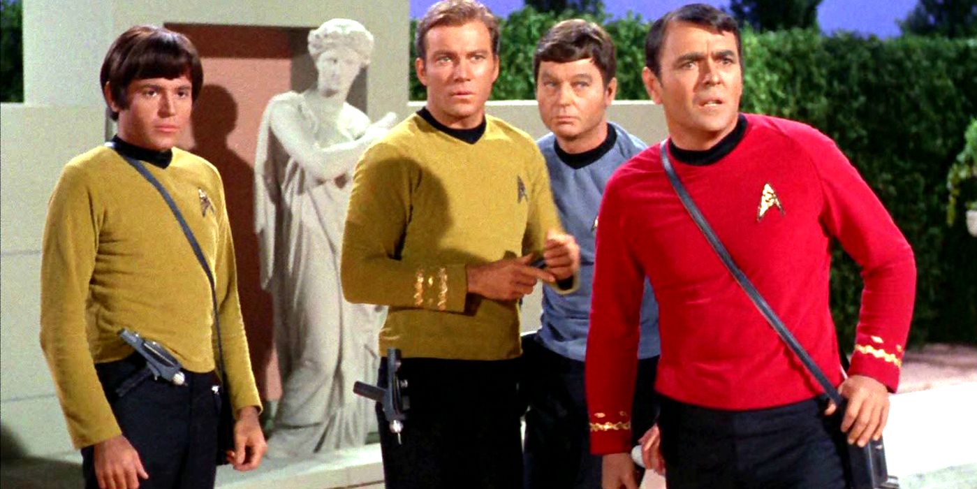 Walter Koenig as Chekov, William Shatner as Kirk, DeForest Kelley as Dr. McCoy, and James Doohan as Scotty looking shocked in Star Trek