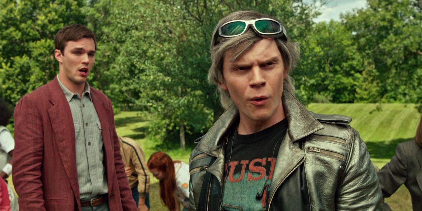 Evan Peters as Quicksilver looking satisfied while surrounded by confused X-Men in X-Men: Apocalypse (2016)