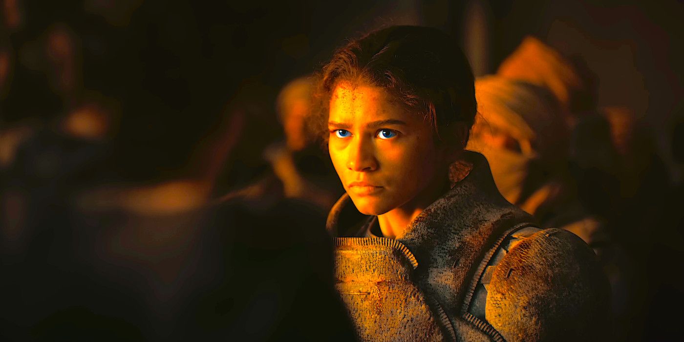 Zendaya gazing intently at a shadowy figure in a scene from Dune: Part Two