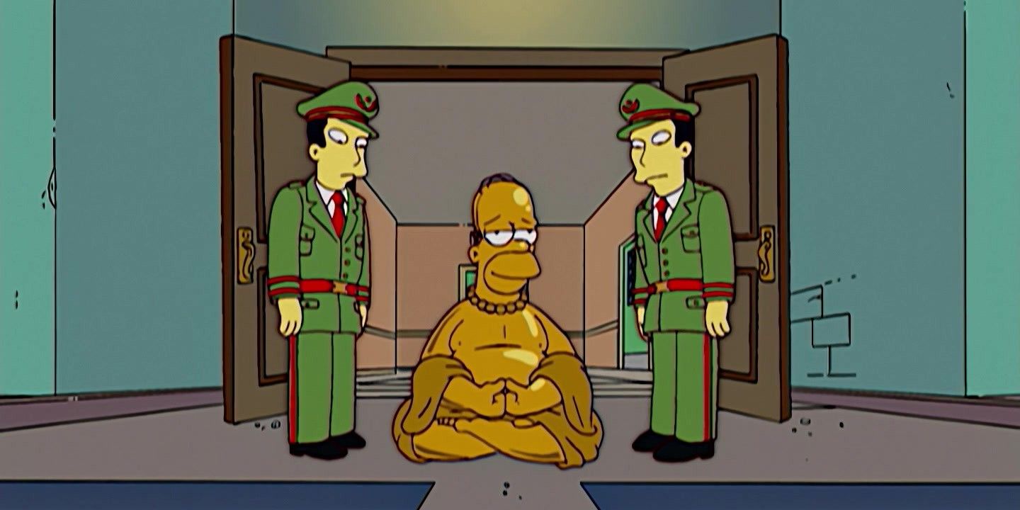 Homer painted gold and pretending to be buda