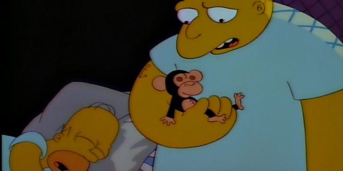 Leon (Michael Jackson) with Homer in the ward holding his toy of Bubbles the Monkey