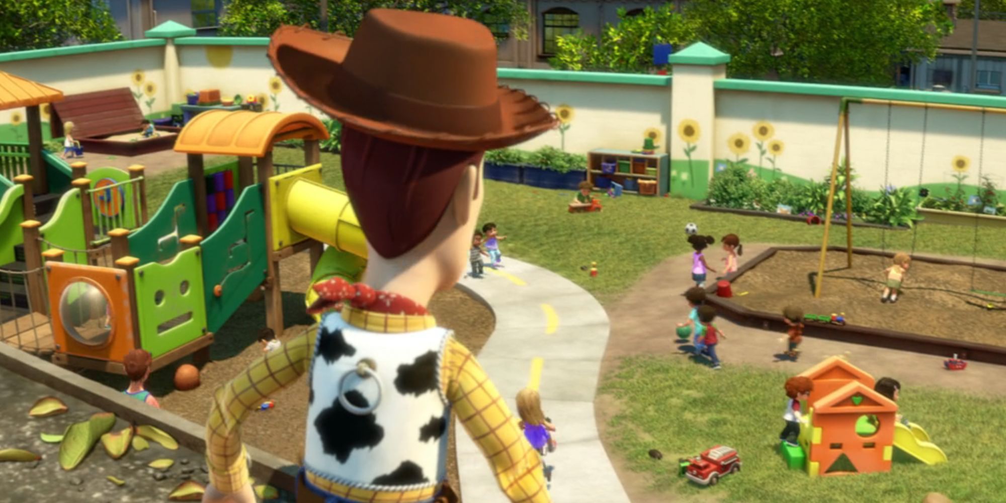 Woody looking out over a playground from the roof in Toy Story 3