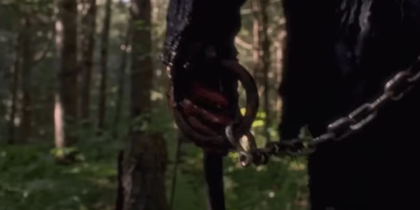 A bloody hand holds a hook in the trailer for In A Violent Nature