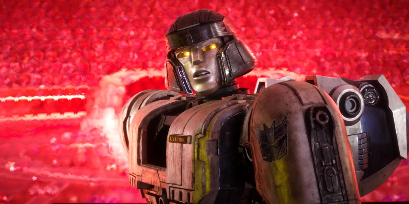 A Decepticon standing in front of a red background in Transformers One