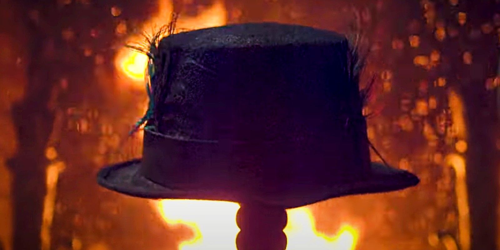 a menacing, scary black hat against a fiery background in the Hanky Panky trailer