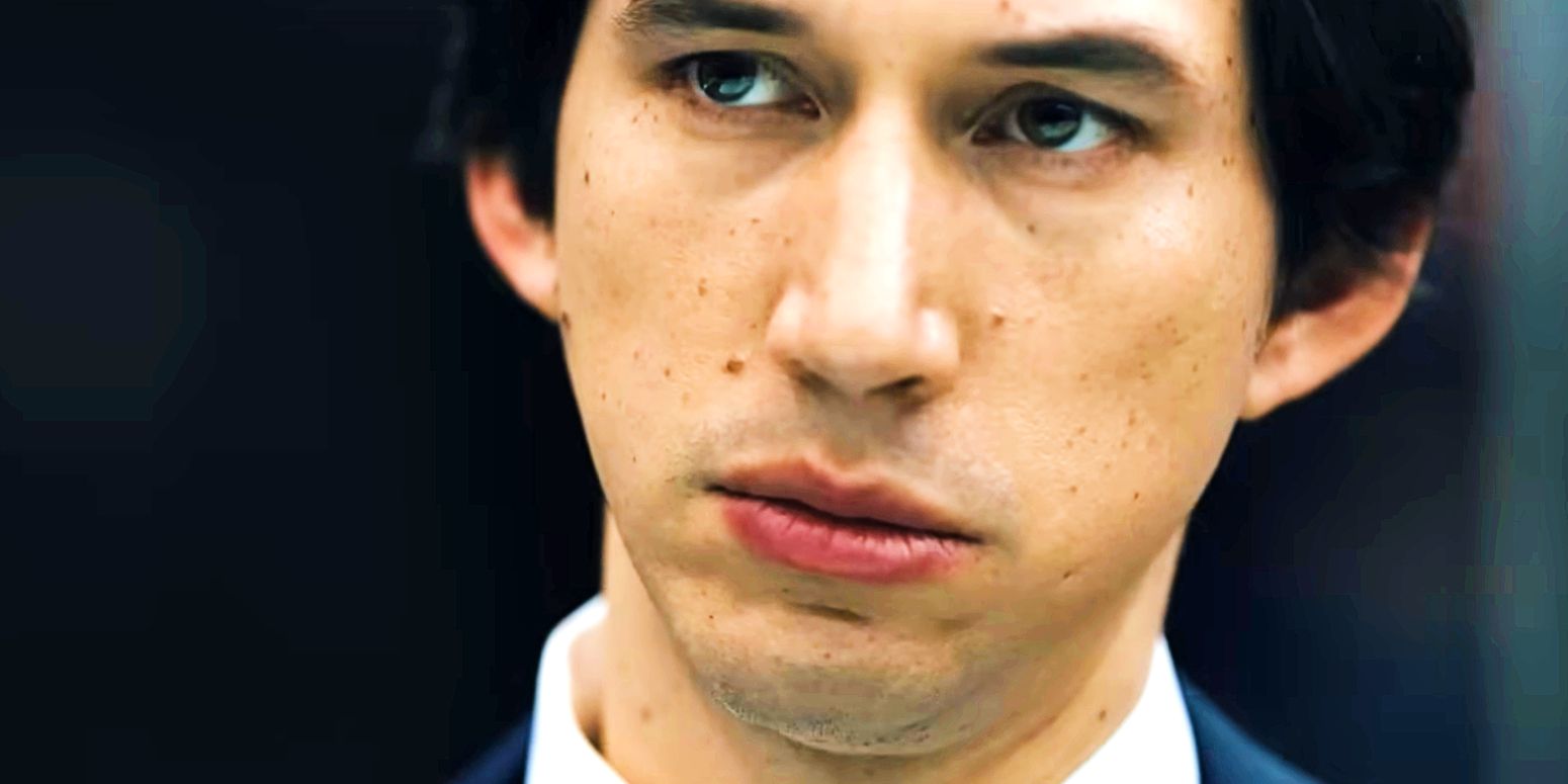 Adam Driver in close-up with a blank expression in The Report