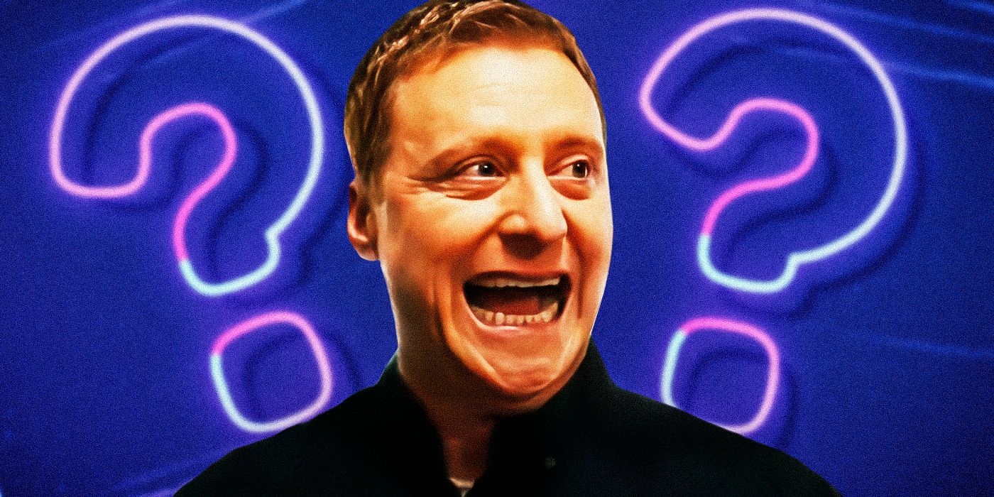 A custom image of Alan Tudyk as Harry Vanderspeigle from Resident Alien laughing in front of a backdrop of question marks
