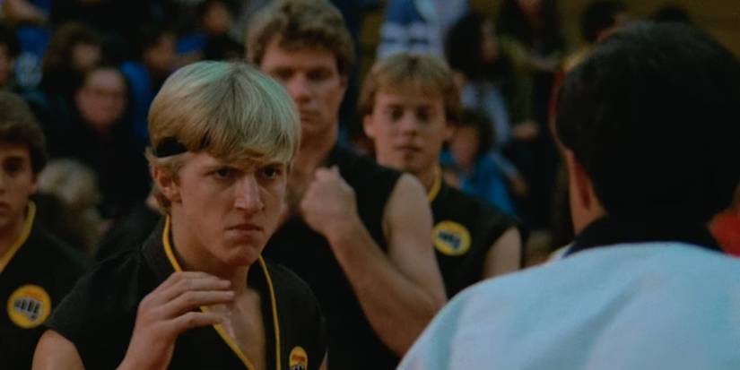 William Zabka as Johnny Lawrence gets ready to fight in The Karate Kid (1984)