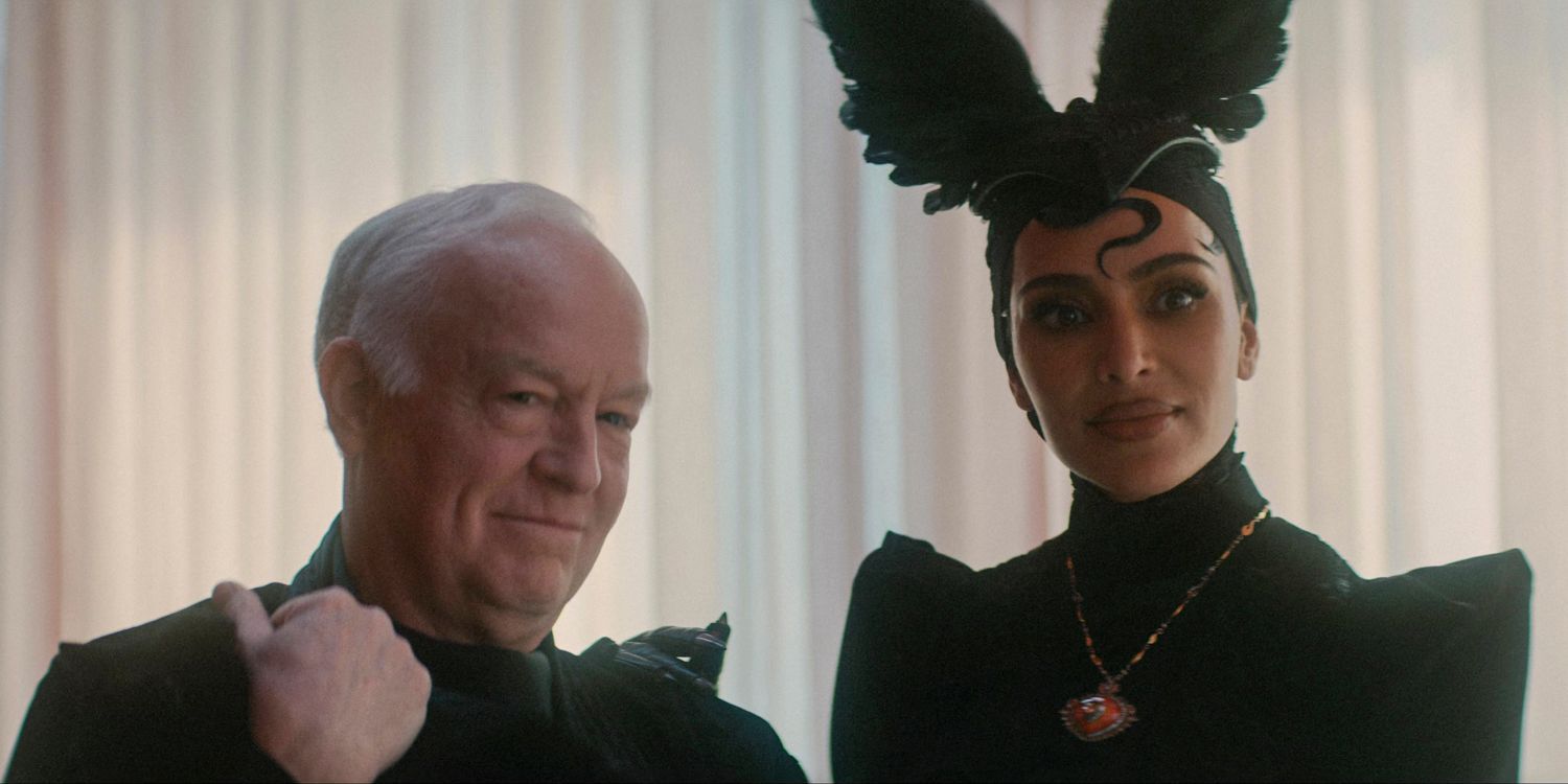 An old man and Siobhan in her ceremonial attire carry Anna's baby in American Horror Story Delicate season 12 ep 9 (FINALE)