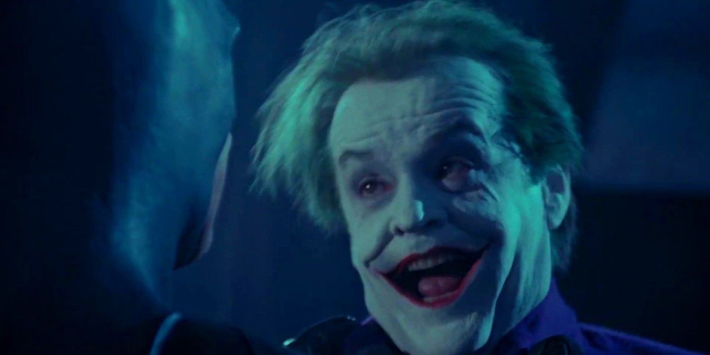 batman 1989, Jack Nicholson as Joker laughing and looking disheveled while fighting batman