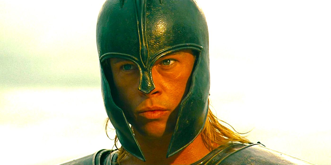 Brad Pitt wearing a battle helmet and glaring menacingly in a scene from Troy