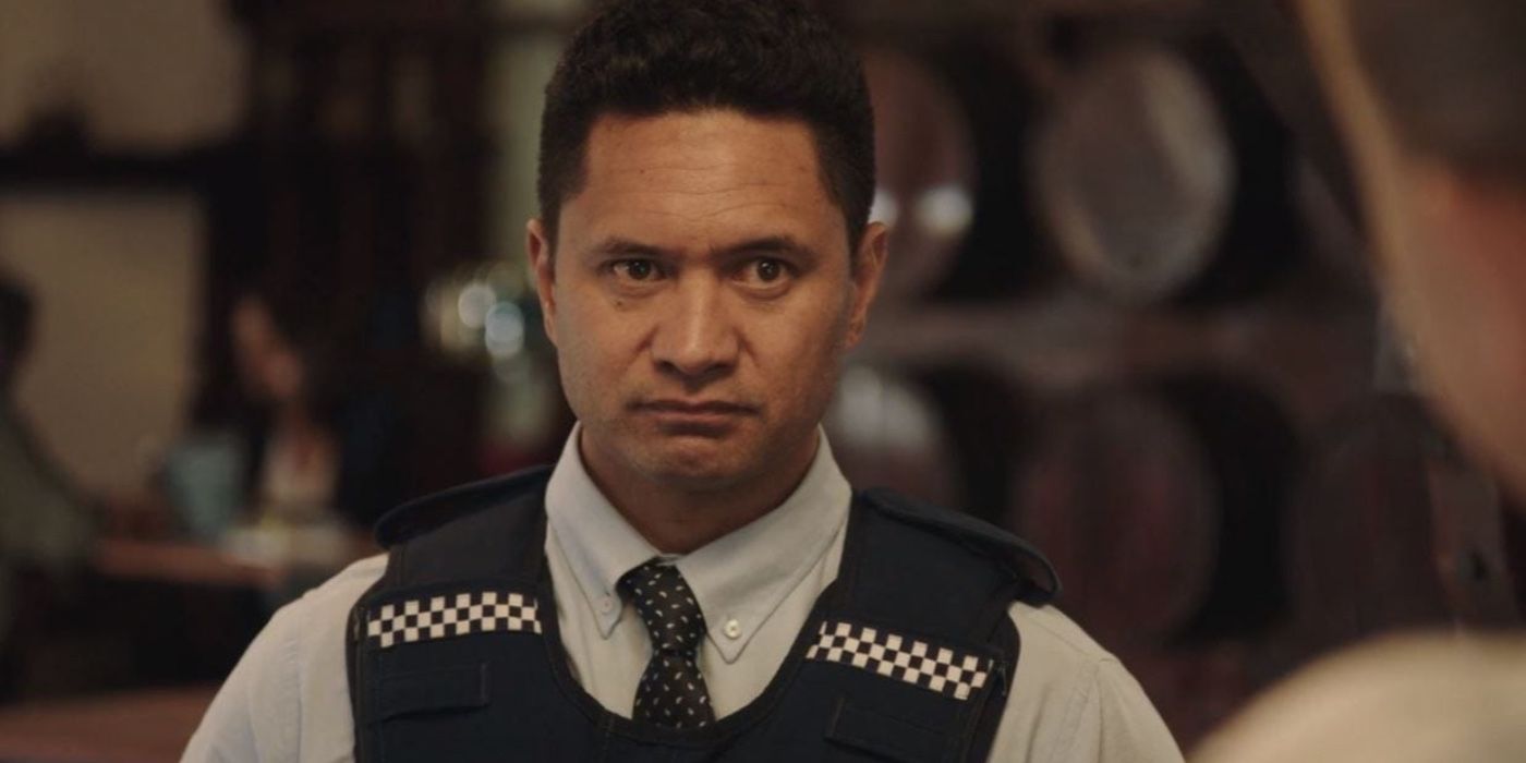 Jarod Rawiri looks on with a serious look in The Brokenwood Mysteries
