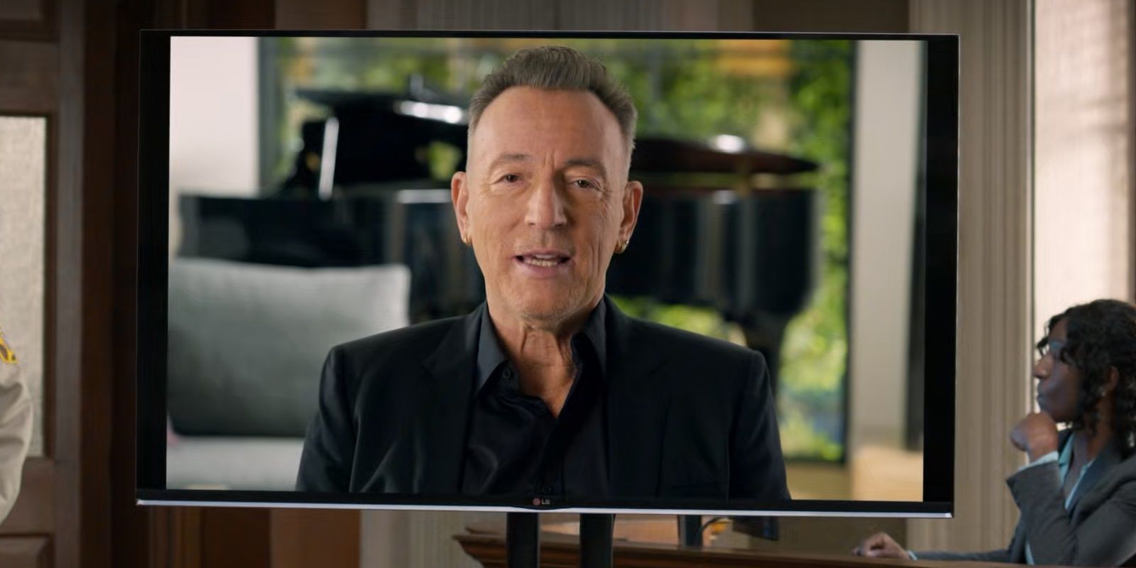 Bruce Springsteen on a TV screen in Curb Your Enthusiasm