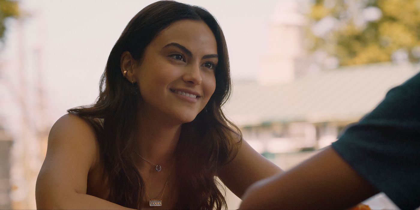 Camila Mendes as Isabella looking happy in Música