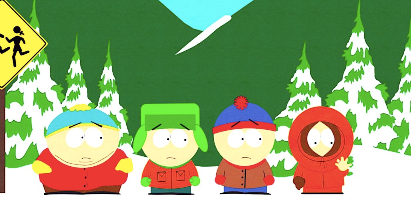Cartman Kyle Stan and Kenny stand at the bus stop as Kenny shows off a ring in South Park