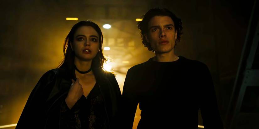 Caterina Ferioli as Nica Dover and Simone Baldasseroni as Rigel Wilde standing together in Netflix's The Tearsmith