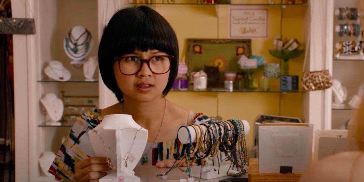 Charlyne Yi is looking at Leslie Mann with a confused expression on her face. 