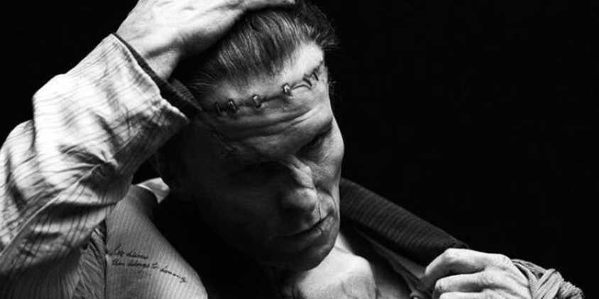 Christian Bale as Frankenstein's Monster Running a Hand Through His Hair in The Bride