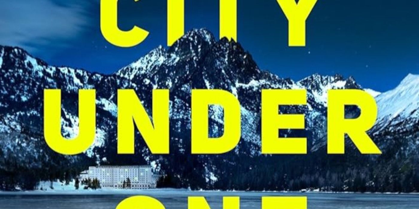 The cover of “City Under One Roof” features a mountain and yellow title text.