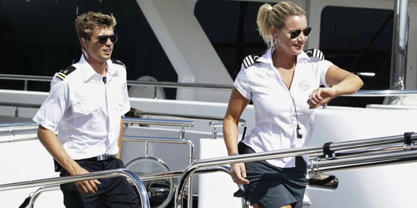 Conrad Empson and hannah ferrier on below deck in uniform