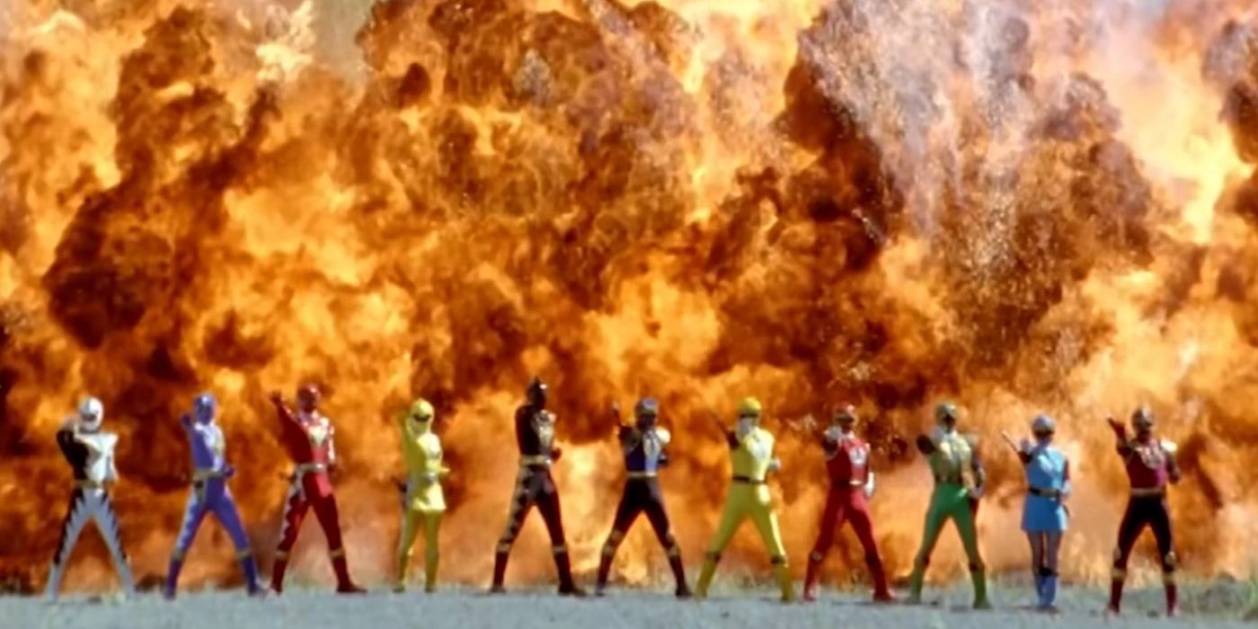 Dino Thunder and Ninja Storm Rangers with an explosion behind them