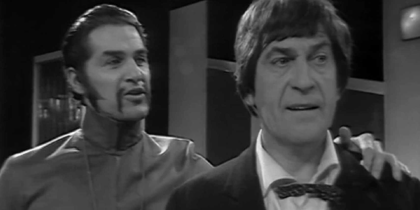 The War Chief puts his hand on the Second Doctor's shoulder in Doctor Who