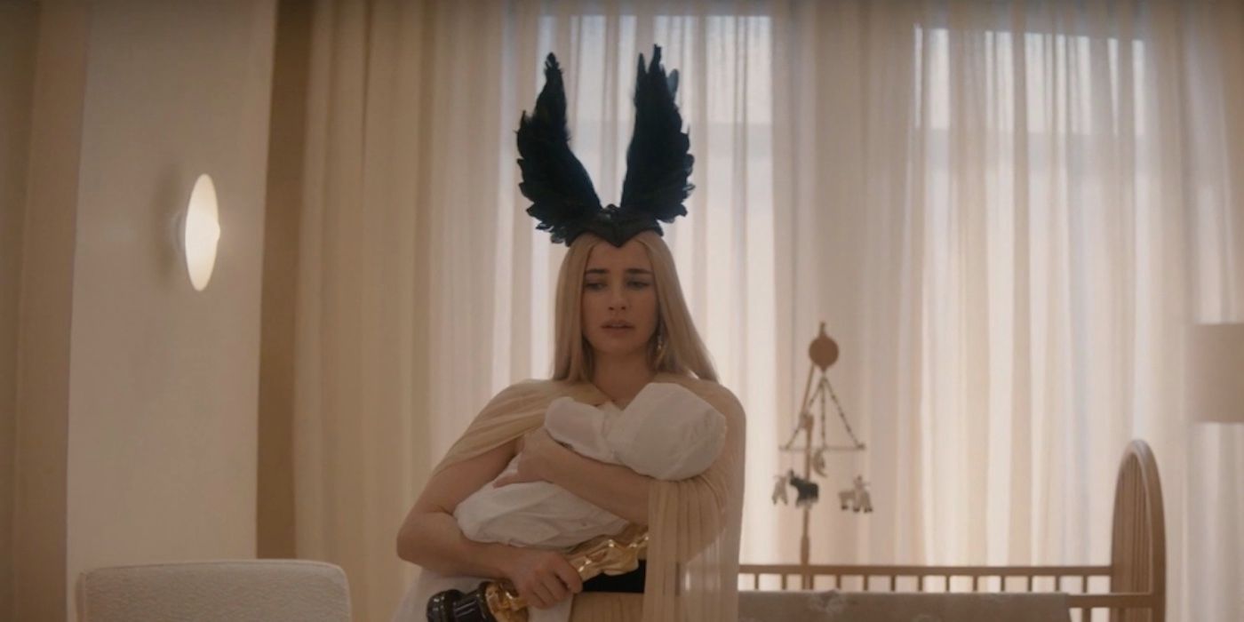 Emma Roberts' Anna cradles her baby and her Oscar in American Horror Story season 12 episode 9