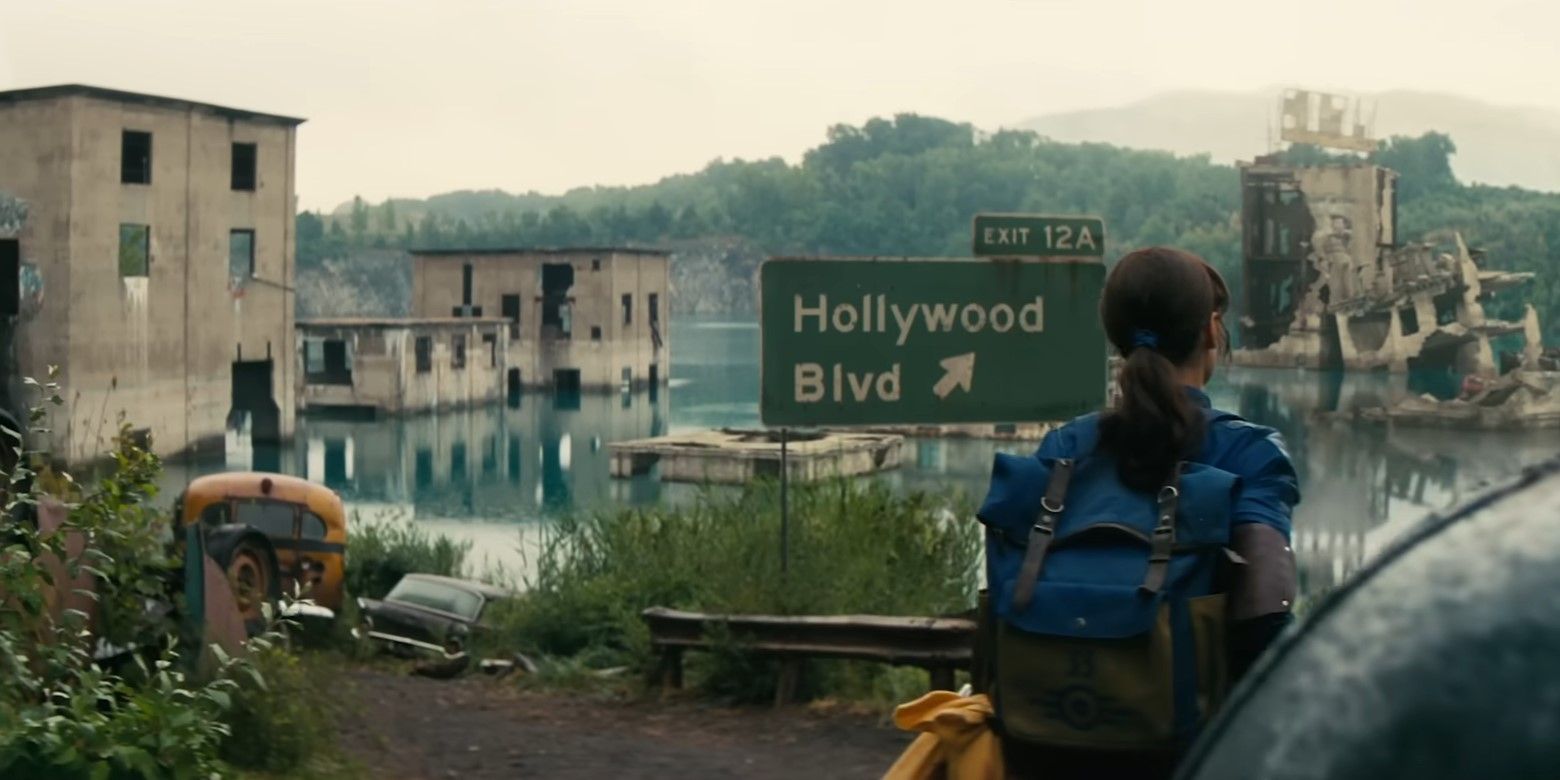Lucy passa por uma cidade inundada e destruída e por uma placa de estrada degradada onde se lê "Hollywood Blvd" no trailer do show Fallout