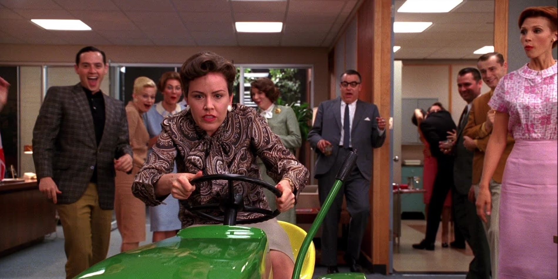 Lois driving the lawnmower in Mad Men season 3 episode Guy Walks Into An Advertising Agency