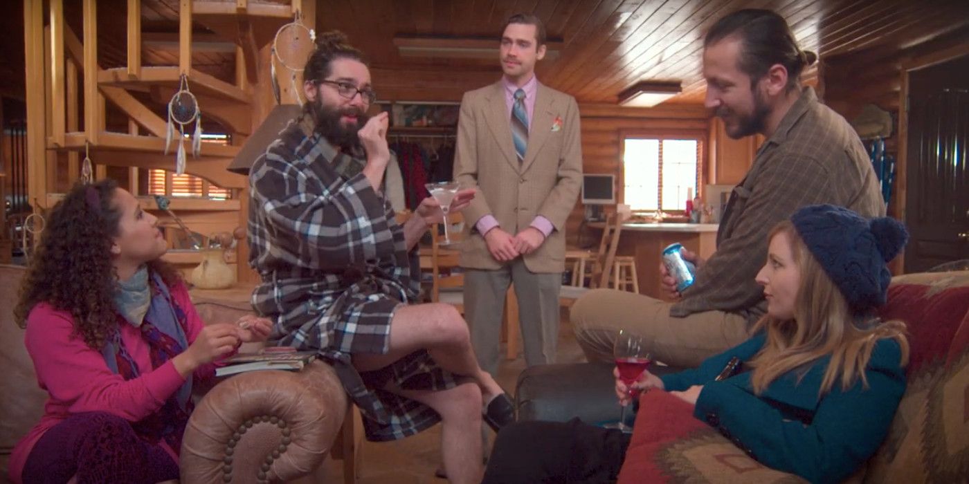 a group of characters sitting in the cabin in a group in the Hanky Panky trailer