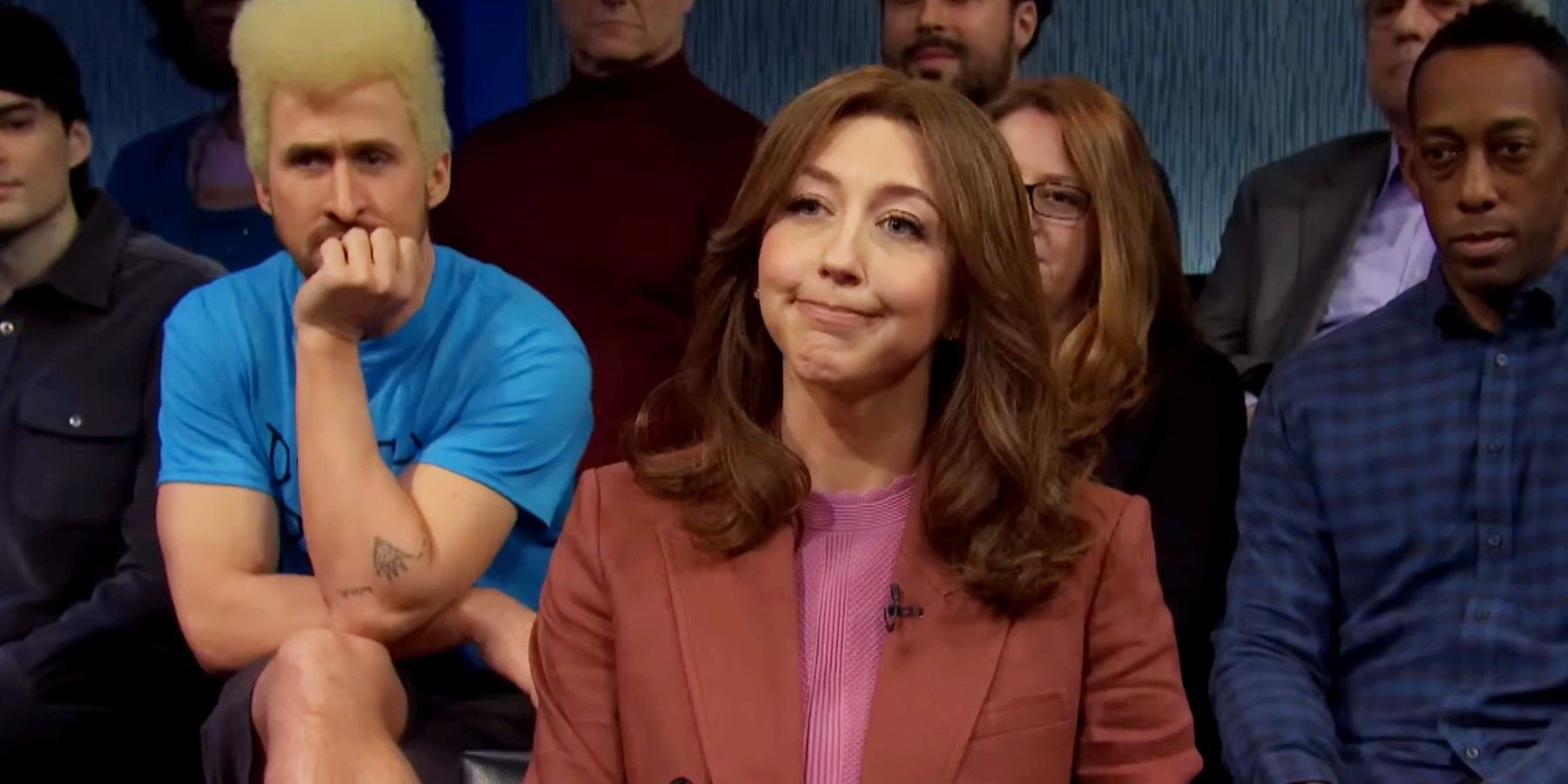 Heidi Gardner as a host while Ryan Gosling is dressed as Beevus in SNL's Beevus and Butthead skit