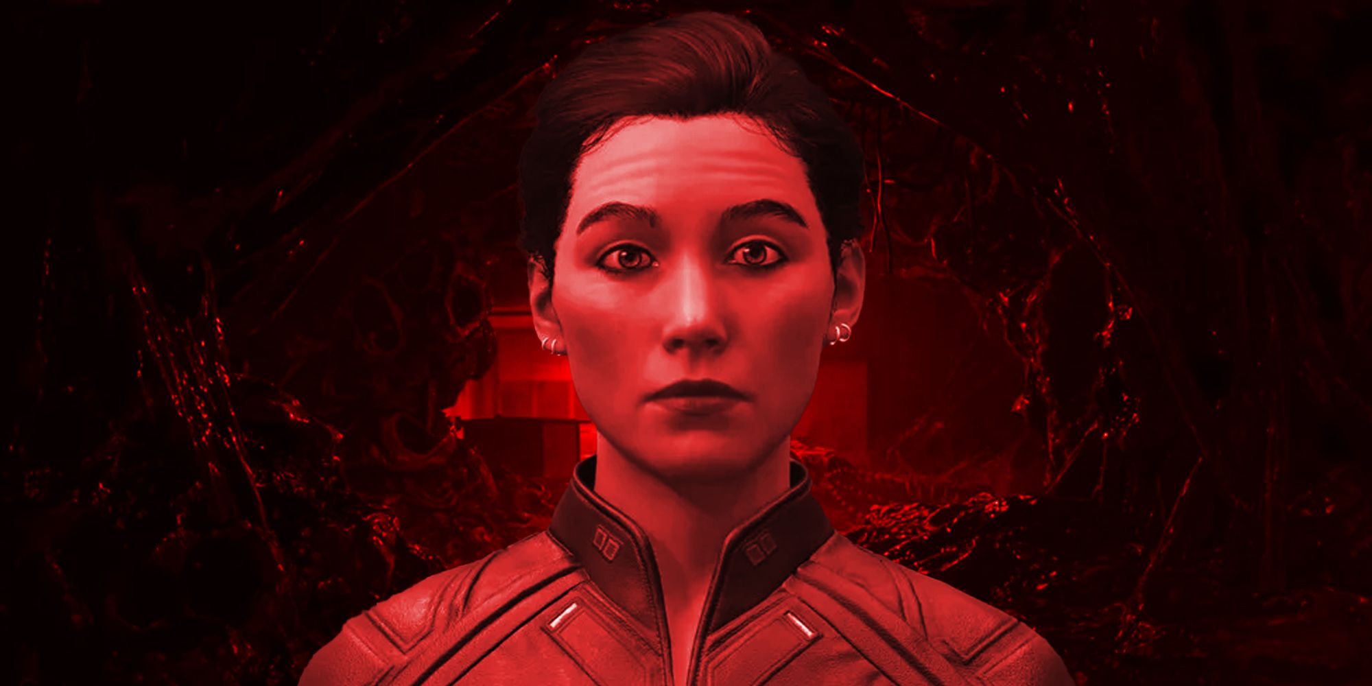 A Starfield character close-up looking straight into the camera with an Interloper nest behind them bathed in creepy red lighting 