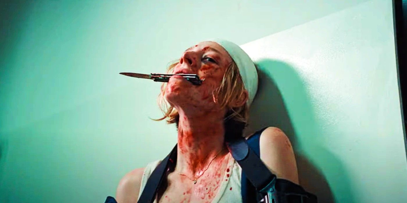 Hunter Schafer injured and holding a knife in her mouth in Cuckoo