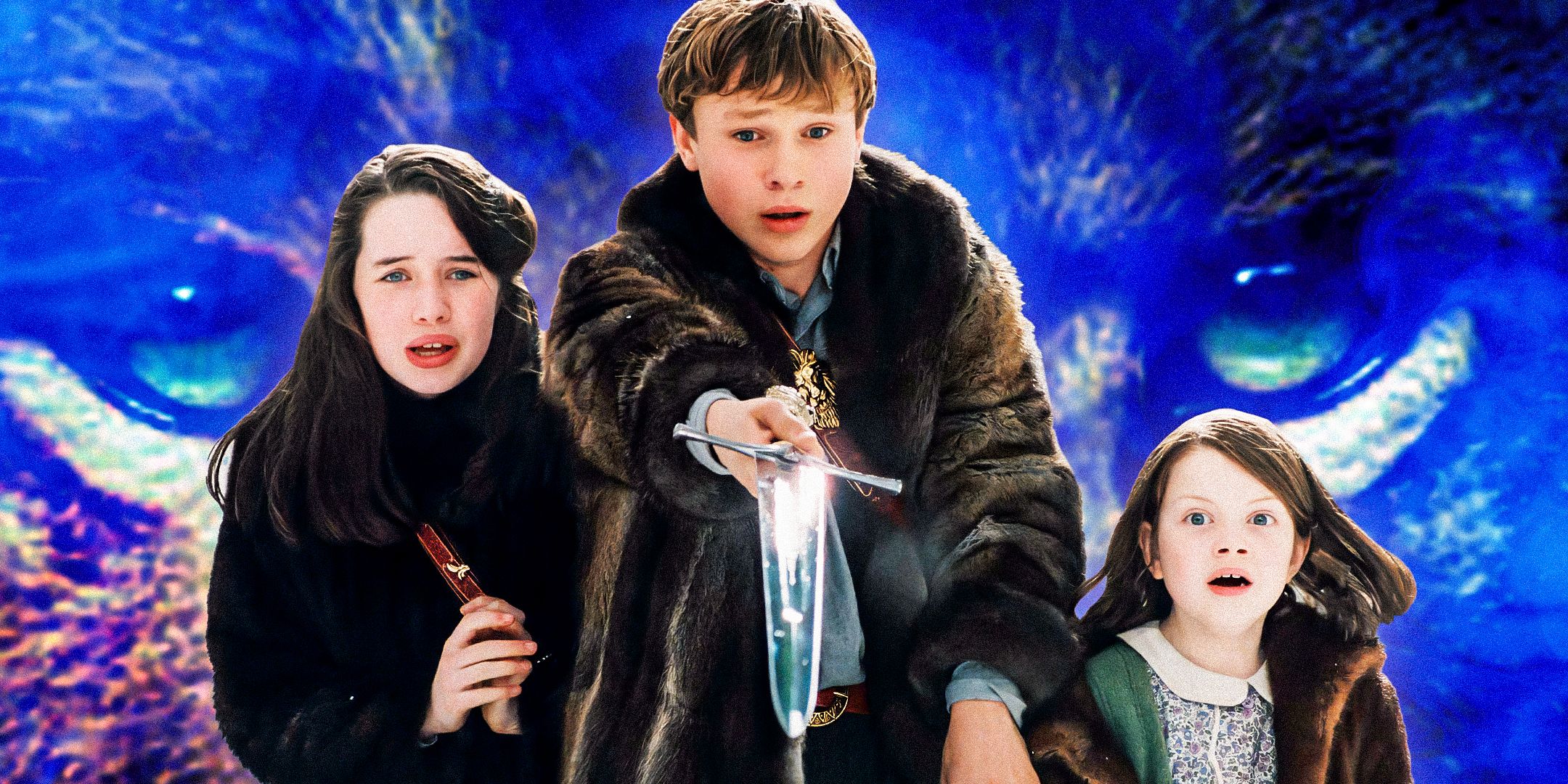 Three of the Pevensie Siblings from The Chronicles of Narnia in Front of Aslan