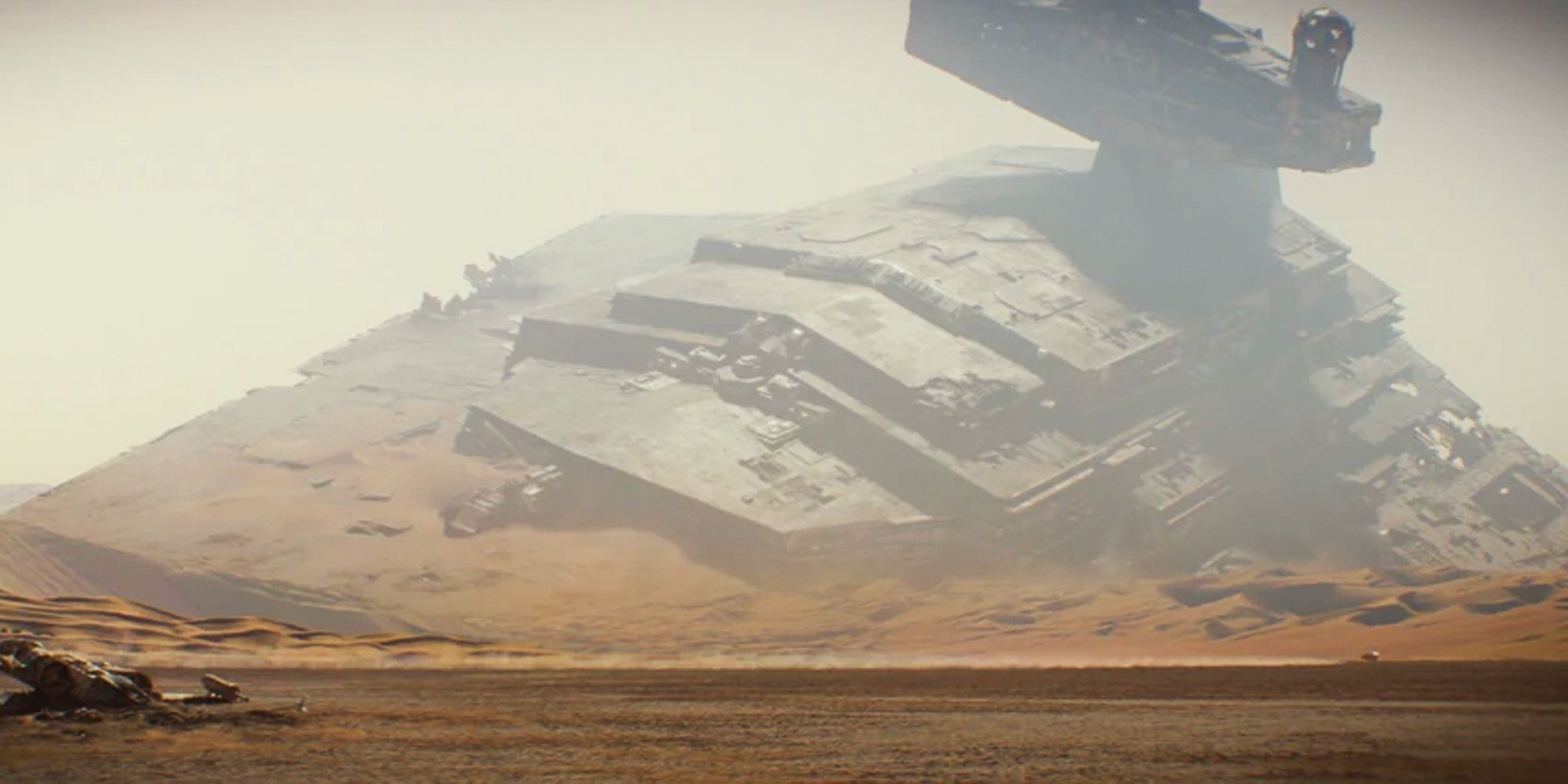 The Jakku Star Destroyer Inflictor crashed into the planet and stuck in the sand