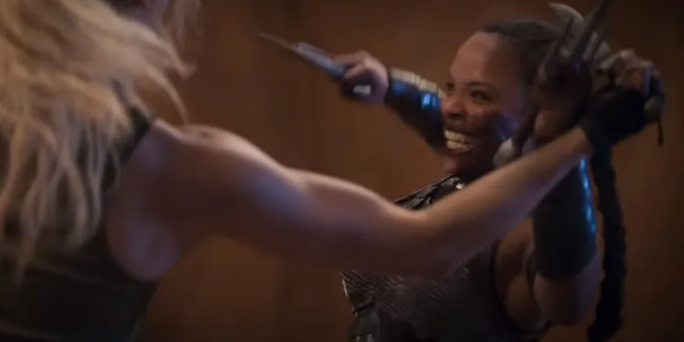 Jessica McNamee as Sonya Blade fights Sisi Stringer as Mileena in Mortal Kombat 2021