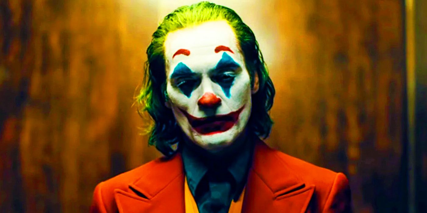 Joaquin Phoenix as Arthur Fleck in full clown make-up in Joker