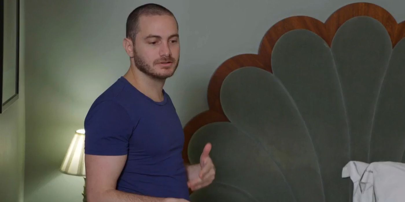 Kyle Gordy In 90 Day Fiance discussing his sperm donation hobby in blue shirt
