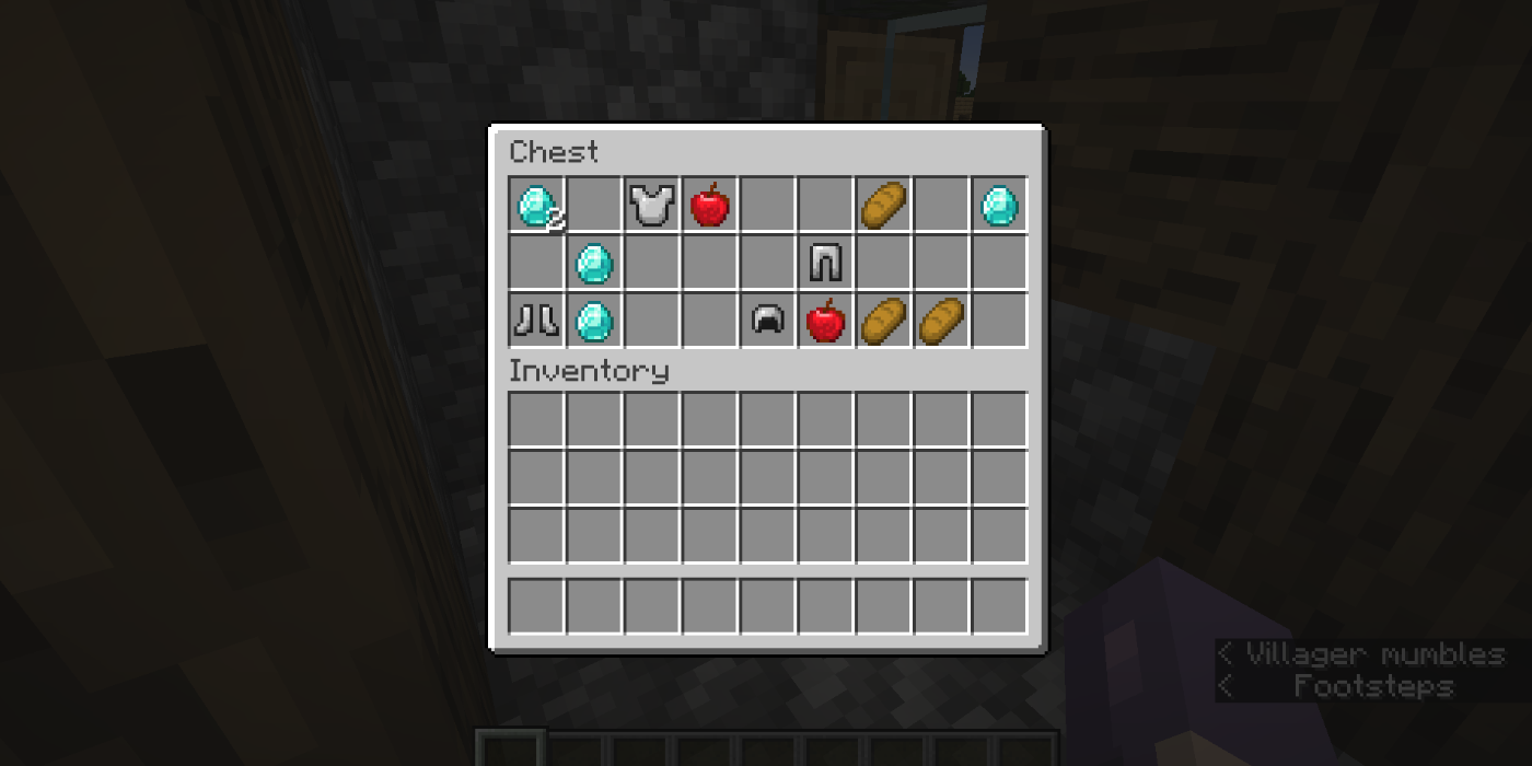 Baú contendo diamantes, armadura de ferro, pão e maçãs no Minecraft.