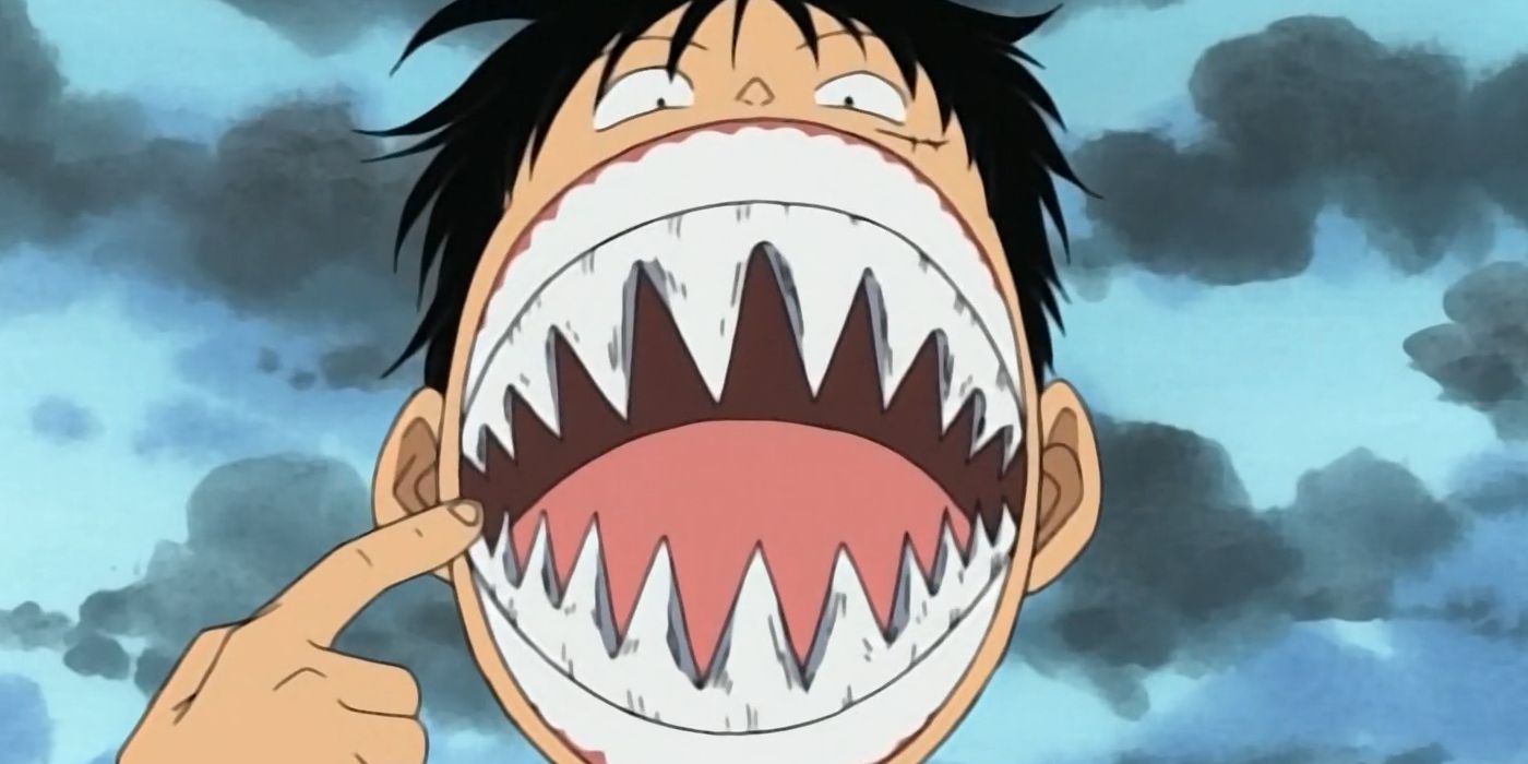Luffy wears arlong's pointy teeth in one piece