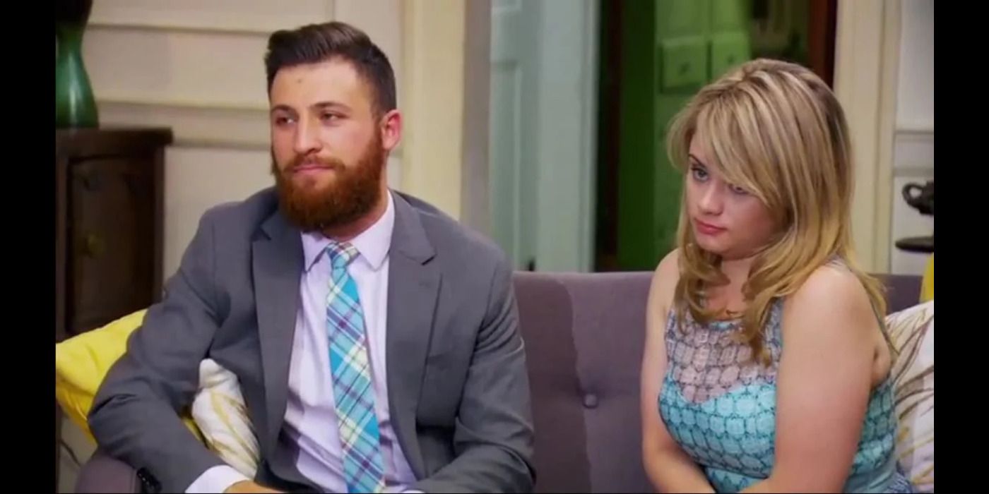 Luke and Kate on the couch looking moody married at first sight (1)