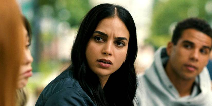 Melissa Barrera as Sam Carpenter looking and talking to friends outside a New York park in Scream 6